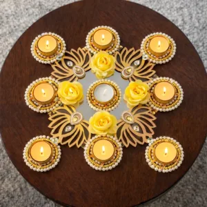 White lotus decorative rangoli with 4 separate tealights