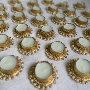 Golden tealight holders (2 pieces packed in a golden organza potli)